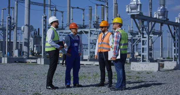 istock Group of diverse workers on solar plant 1061001880