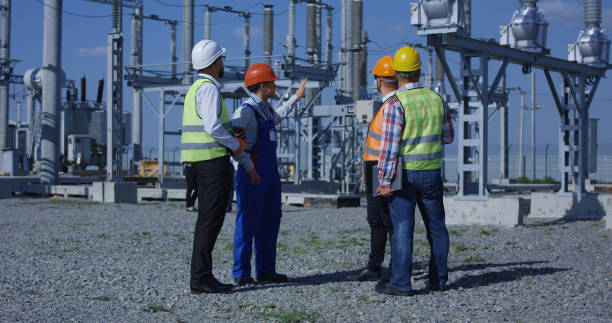 istock Group of diverse workers on solar plant 1061001886