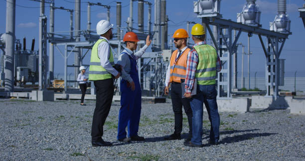 istock Group of diverse workers on solar plant 1061001888