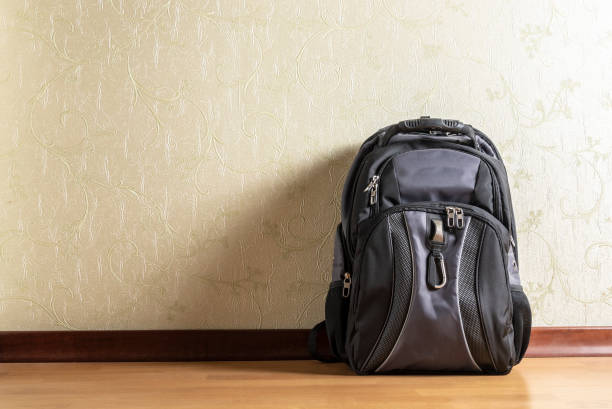 Rather Untouched shelf The Assembled Backpack Stands On The Floor Near The Wall Stock Photo -  Download Image Now - iStock
