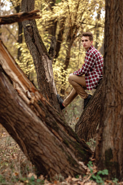 istock Handsome young guy in nature on an autumn day 1061010940
