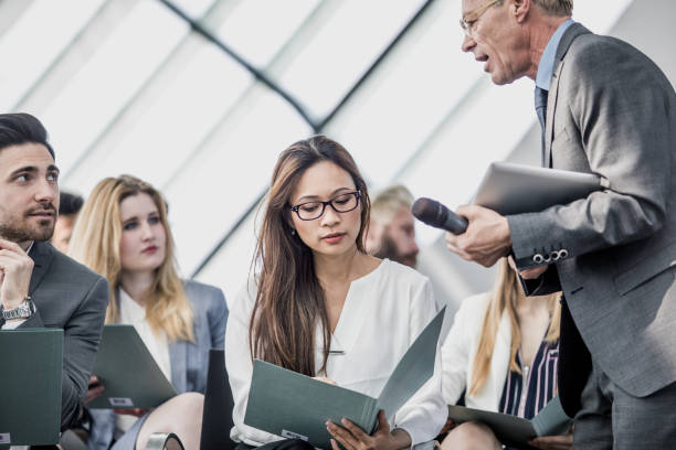 istock Business People at a Conference Event 1061016378