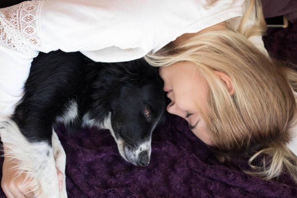 istock happy young pretty girl with her dog 1061016928