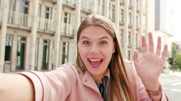 istock Young Lady Chatting on the Phone in Town 1061024670