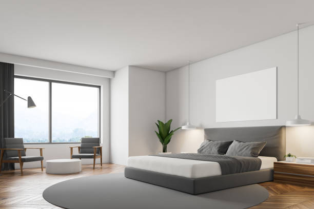 istock White bedroom, gray bed and poster 1061024792