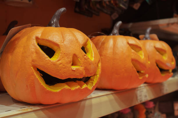 istock scary orange halloween pumpkin jack-o-latern. 1061027424