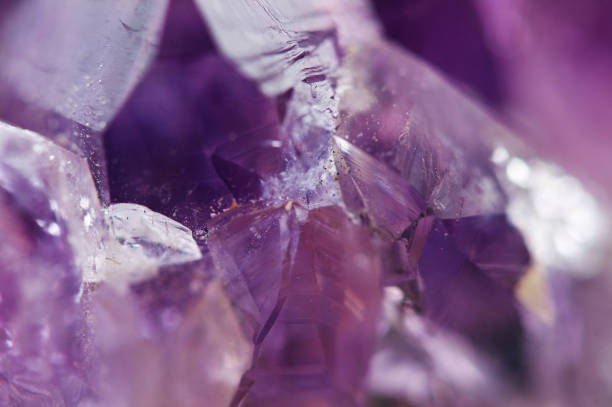 istock Amethyst natural mineral,  beautiful abstract lilac Macro background. Natural light translucent crystal, extreme close-up. 1061030926