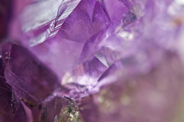 istock Amethyst natural mineral,  beautiful abstract lilac Macro background. Natural light translucent crystal, extreme close-up. 1061030968