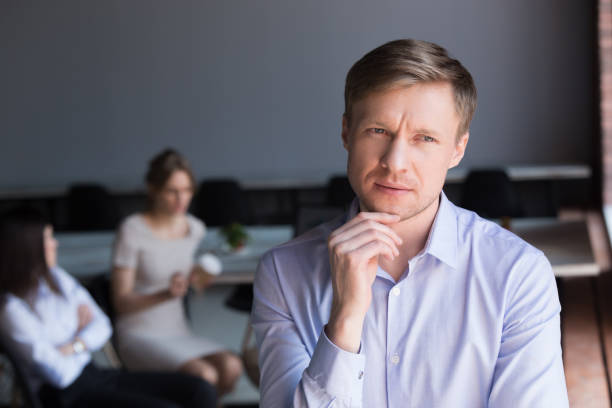 istock Thoughtful doubtful middle aged businessman looking away thinking about challenges 1061031280