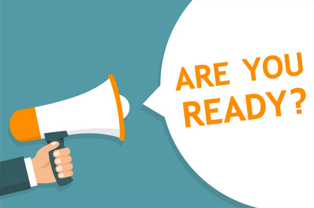 istock Hand holding Megaphone. Announcement. ARE YOU READY! - stock vector. 1061034132