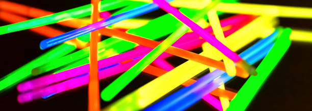istock Multicolor fluorescent chem light neon black background 1061038378