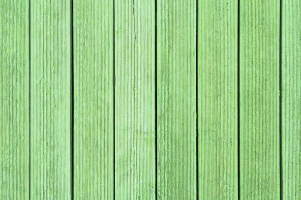 istock Vertical green wooden planks with ribbed surface 1061039508