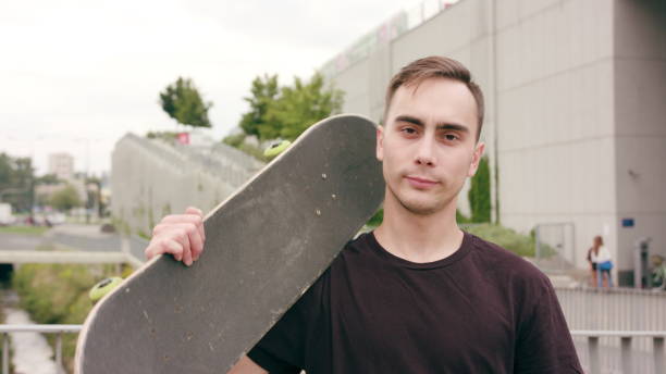 istock A Young Men with a Skateboard in Town 1061049356