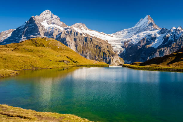 istock Encountering Bachalpsee when hiking First to Grindelwald (Bernese Alps, Switzerland). 1061049796