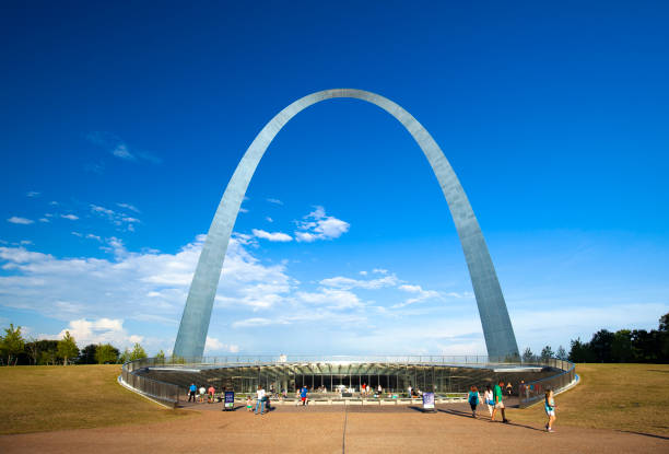 St. Louis, Missouri, USA - July 15, 2018:  The Gateway Arch in downtown St. Louis with many tourists.