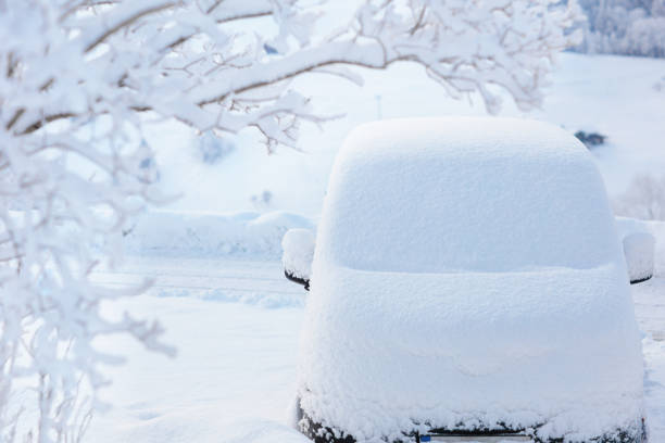 istock Car covered with snow after winter storm. 1061051758