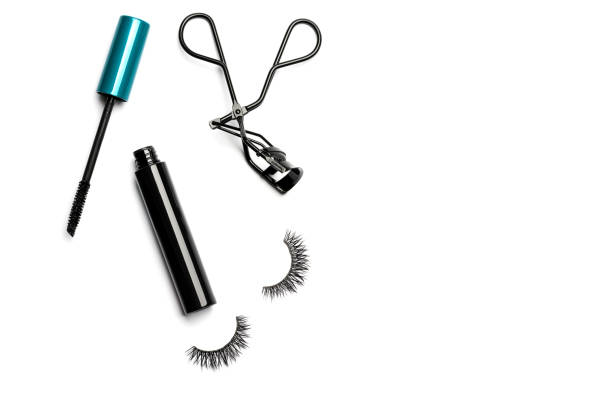 istock Mascara, eyelash curler and false eyelashes on white background 1061052536