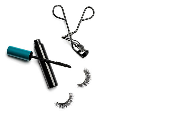 istock Mascara, eyelash curler and false eyelashes on white background 1061052574