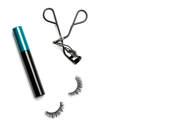 istock Mascara, eyelash curler and false eyelashes on white background 1061052620
