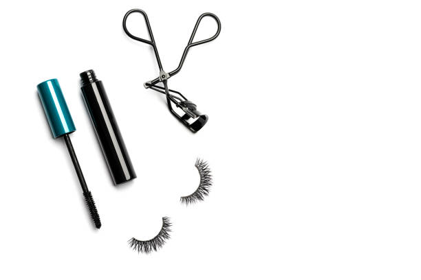 istock Mascara, eyelash curler and false eyelashes on white background 1061052720