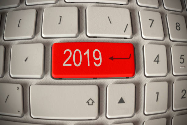 istock on the white keyboard is a red button with the number 2019 in the middle 1061054392