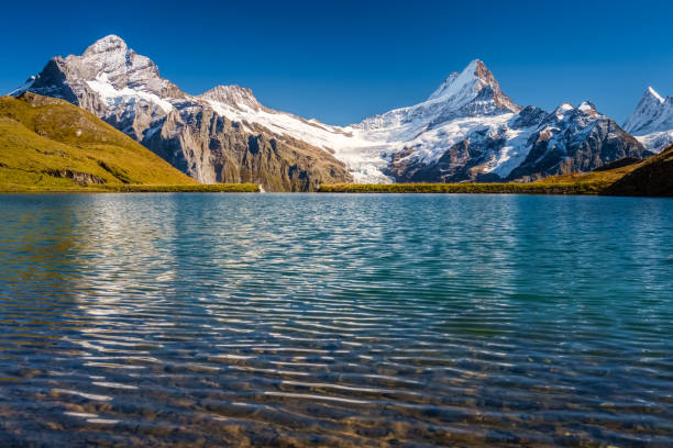 istock Encountering Bachalpsee when hiking First to Grindelwald (Bernese Alps, Switzerland). 1061056414
