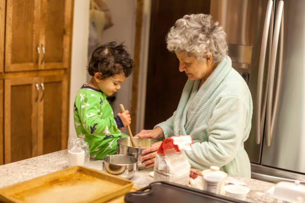 istock Grandma Making Pancakes for Grandson 1061060390