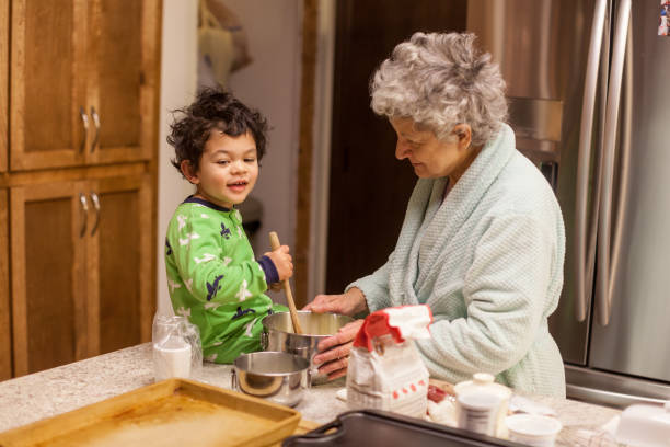 istock Grandma Making Pancakes for Grandson 1061060426