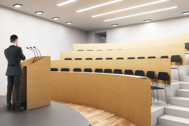 istock European businessman in auditorium 1061061132