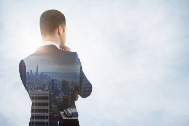istock Thinking businessman in city 1061061140
