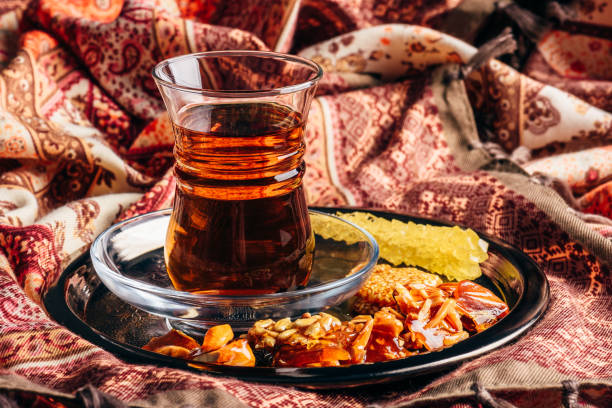 istock Tea in armudu with oriental delights and crystal sugar 1061061162