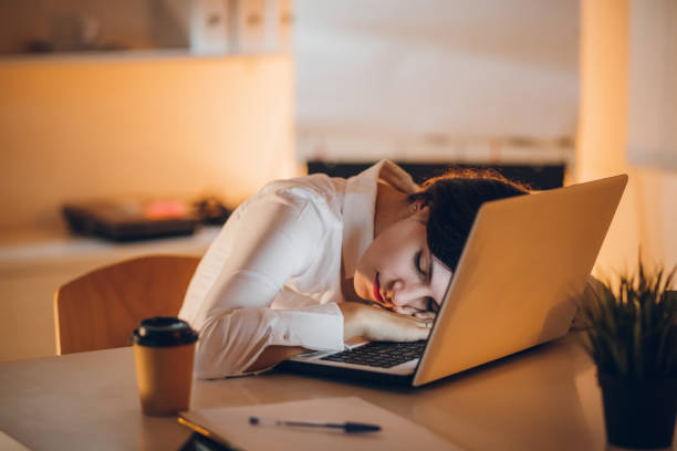 istock Businesswoman sleeping on laptop 1061064606