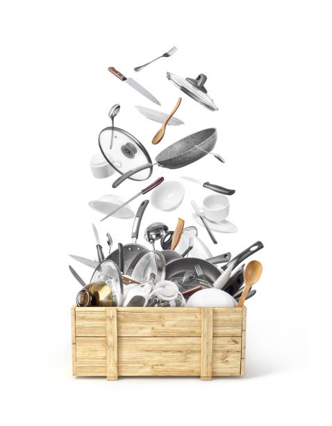 istock Wooden box with flying utensils isolated on white background 1061065020