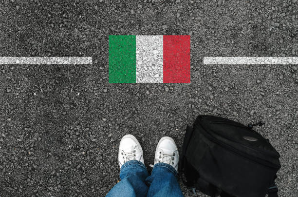 man with a shoes and  flag of italy stock photo