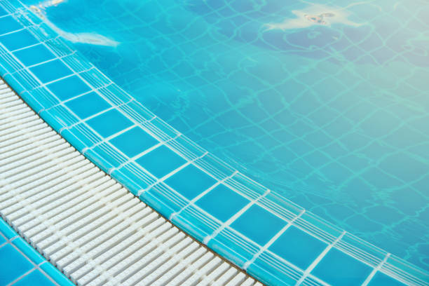 istock Overflow grating of swimming water pool. 1061068038