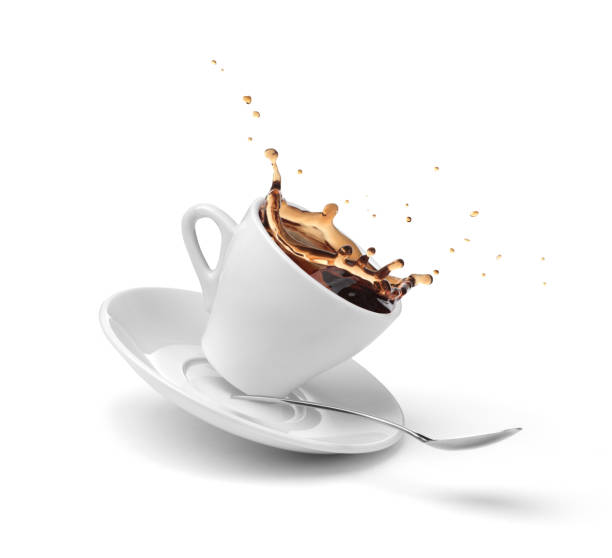 istock coffee splashing out of a cup isolated on white 1061068076