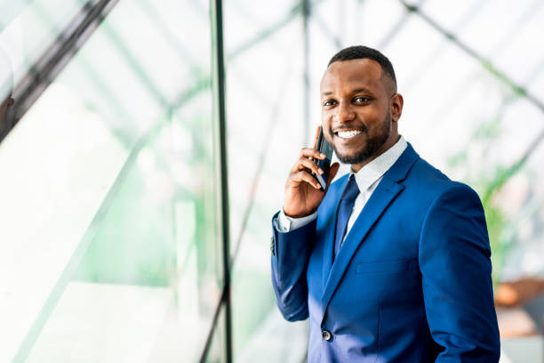 istock Businessman with a mobile phone 1061078052