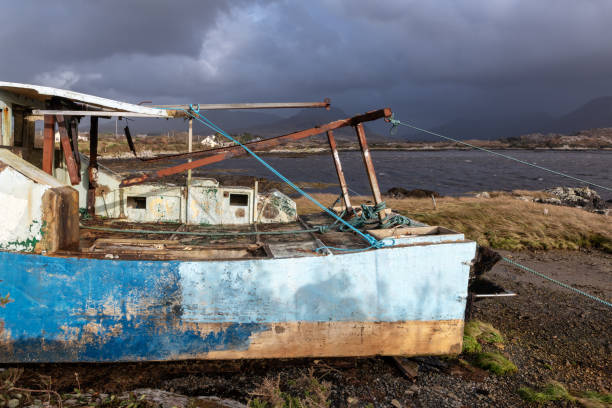 istock Old boat, Harbour Derryherbert, Galway, Ireland 1061079770