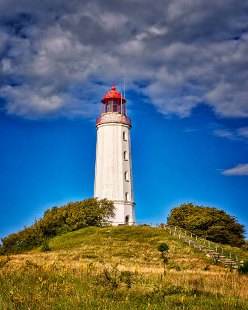 This lighthouse was built by the Kingdom of Denmark in 1852. This makes it the oldest lighthouse on the west coast of Schleswig-Holstein.The lantern house consists of a steel structure with a copper roof. The structure height is 11.3 meters above ground and the fire height is 19 meters above MThw. The beacon serves as an oriental marker beacon for the \