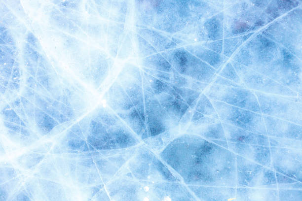 istock texture of a beautiful blue ice with cracks 1061084818
