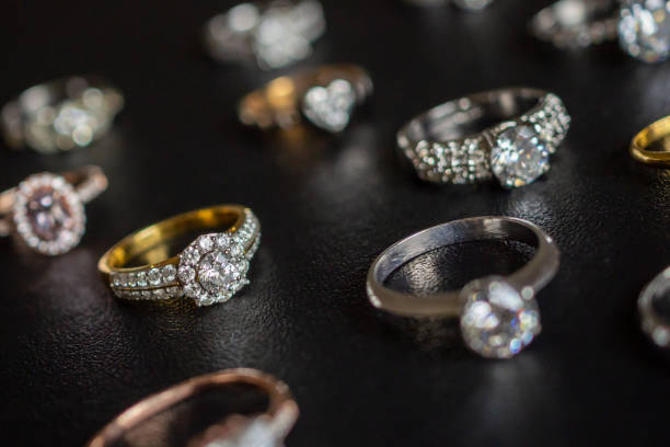 istock Jewelry diamond rings set on black background close up 1061084992