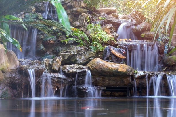 istock Waterfall in garden at the public park 1061085722