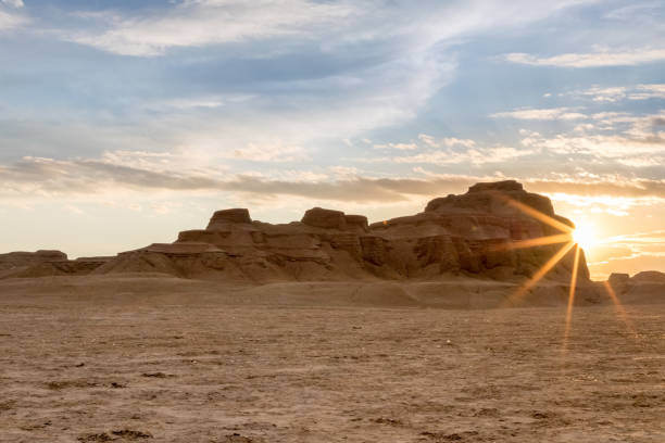 istock wind erosion landform landscape in sunset 1061089690