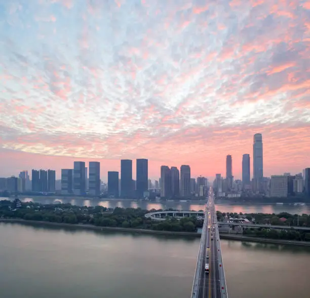 changsha in sunrise,the bridge over the beautiful xiangjiang river, China