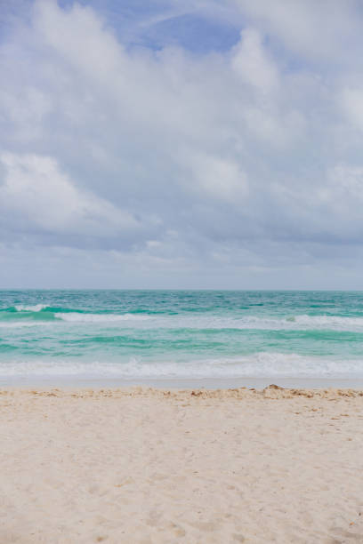 istock Miami beach by ocean under clouds in Miami, Florida, USA 1061091304