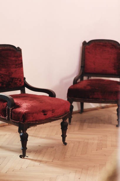 istock Retro red velvet chairs interior corner 1061097142