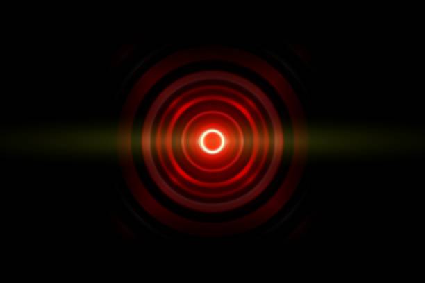 istock Abstract dark red circle with sound waves oscillating, technology background 1061106610