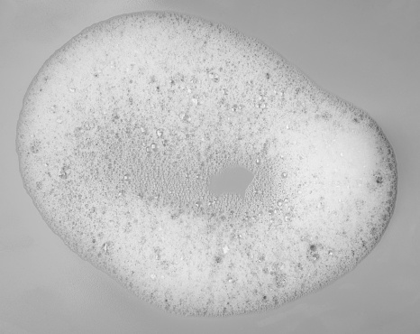 Foam bubble on gray background on top view object beatuy health care concept design