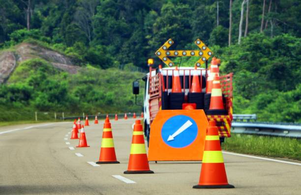 istock Row of traffic cone and sign 1061123452