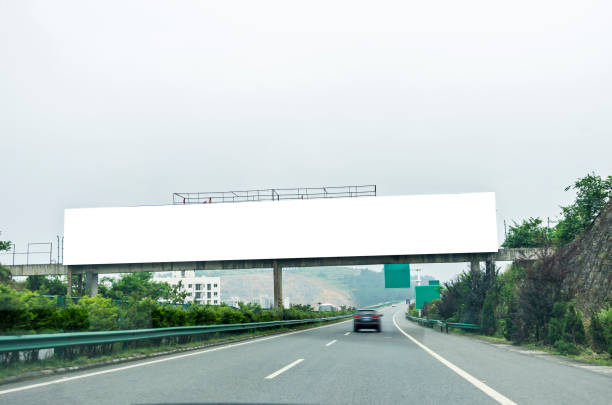 istock Blank billboard on blue sky background for new advertisement 1061133802